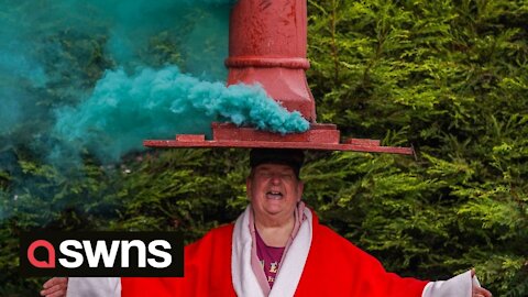 Pensioner raises £250k for charity by balancing heavy items on his head