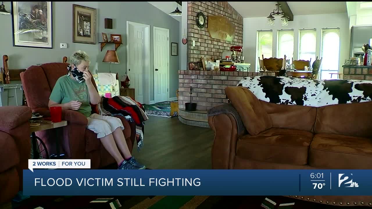 Flood victim still fighting