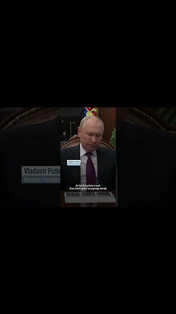 Putin pays respect to dead in plane crash