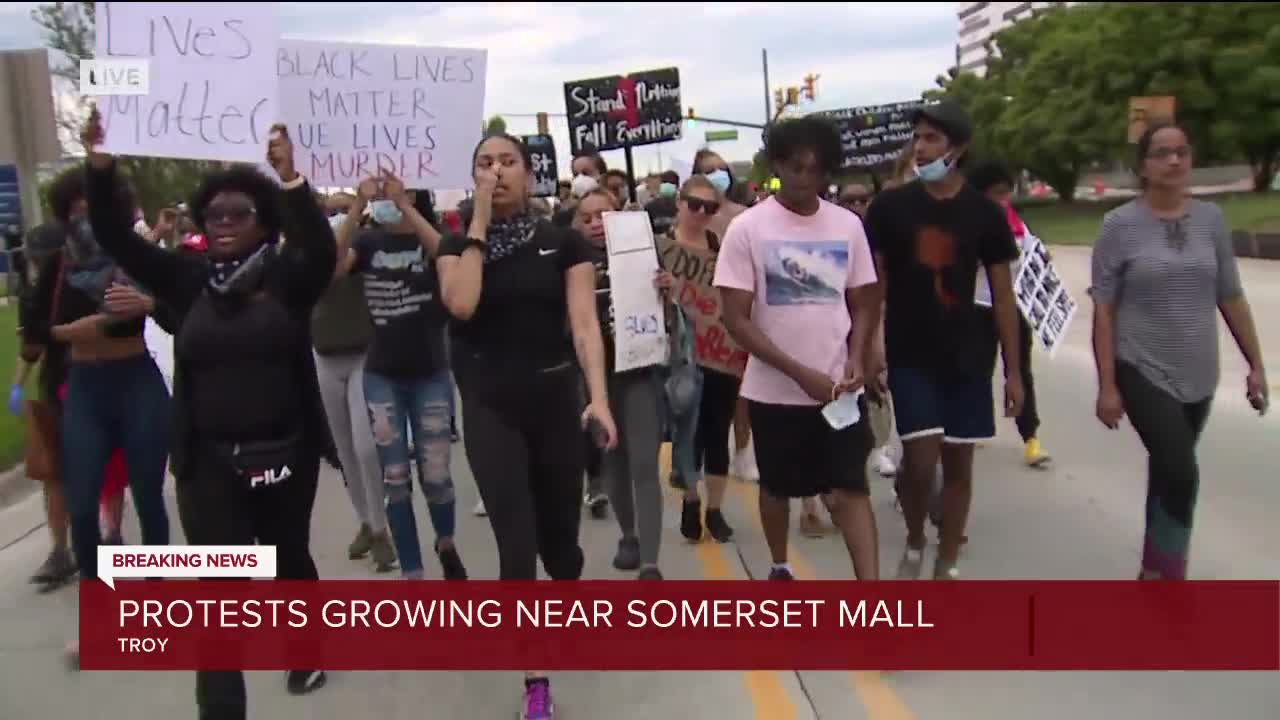 Hundreds walk along Big Beaver Road in Troy as protests continue after the killing of George Floyd