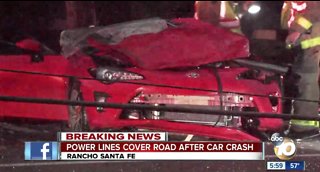 Live power lines block Rancho Santa Fe crash