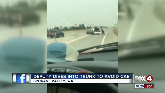 Deputy Dives Into Trunk to Avoid Car