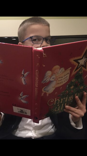 Gifted Child plays Silent Night on the piano