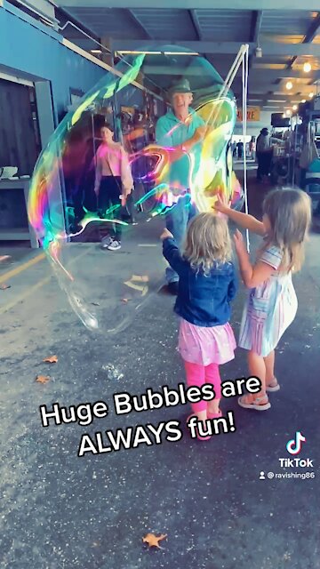 Huge bubbles slow mo pop