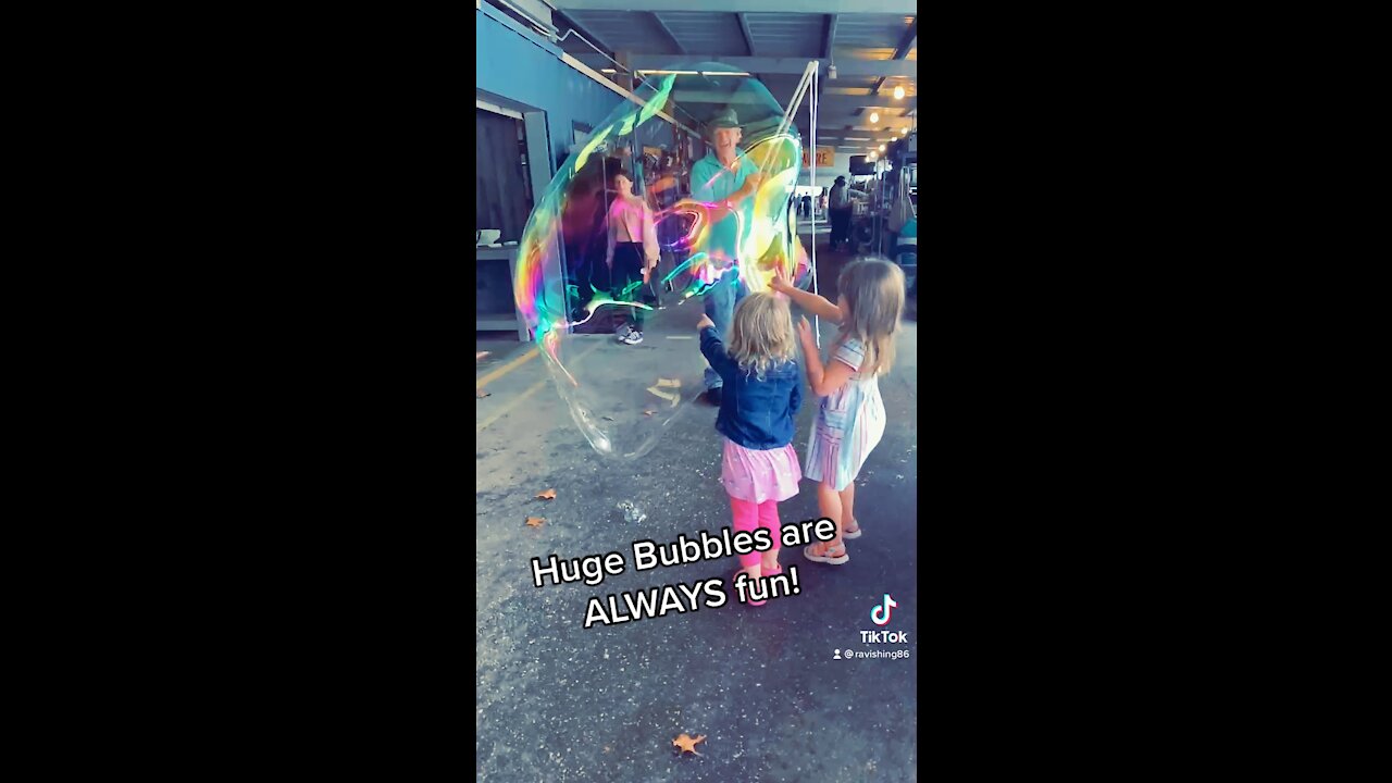 Huge bubbles slow mo pop