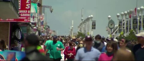 States ease restrictions as crowds gather for Memorial Day