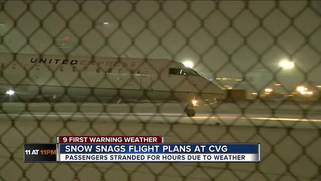 Snow stalls planes at CVG