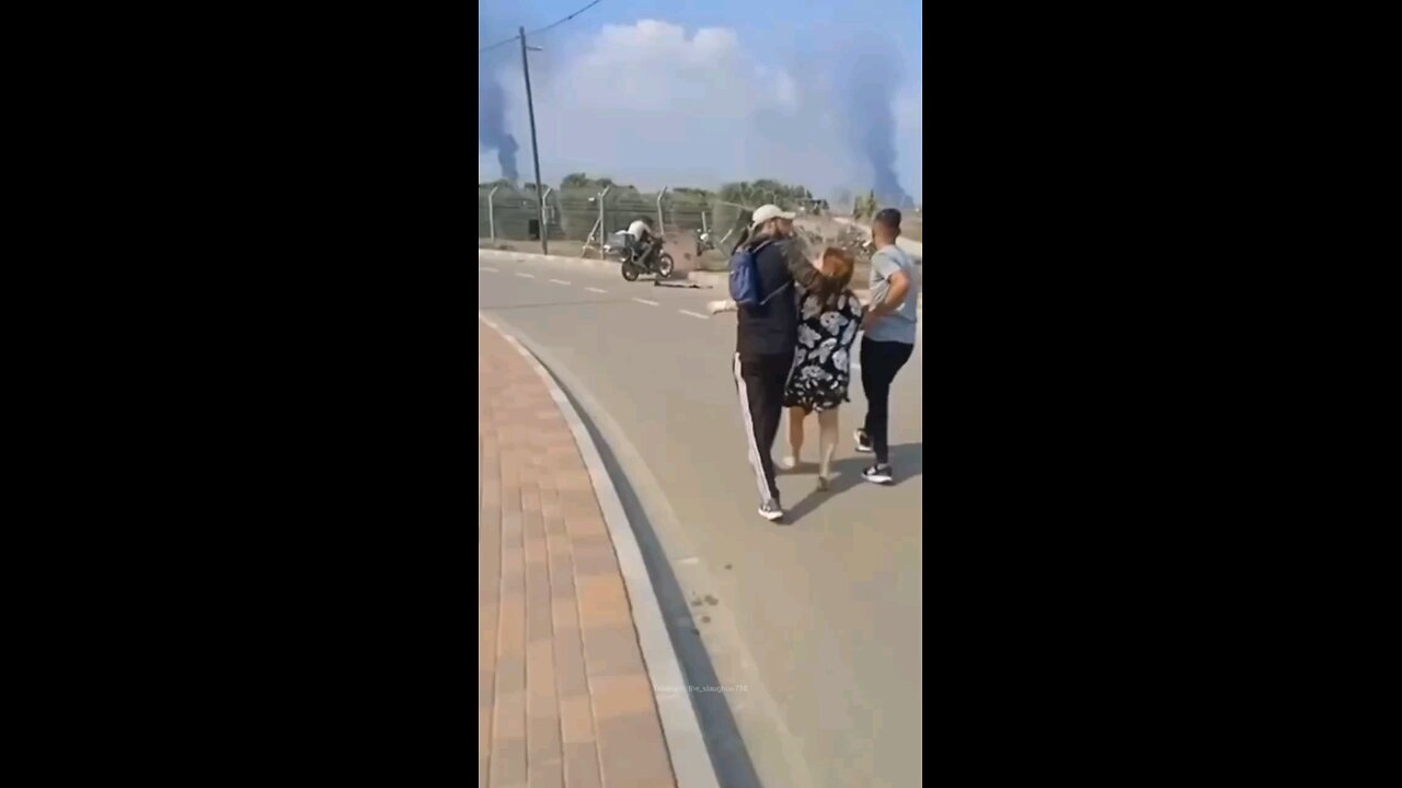 "Innocent" Palestinazi civilians lead an Elderly Israeli woman to Gaza on Oct.7th.