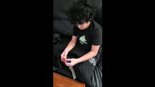 Rubik's cube expert. Watch this young man solve the puzzle in less then 30 seconds!