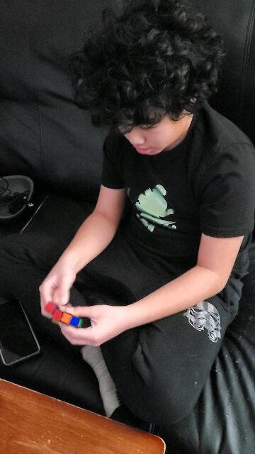 Rubik's cube expert. Watch this young man solve the puzzle in less then 30 seconds!