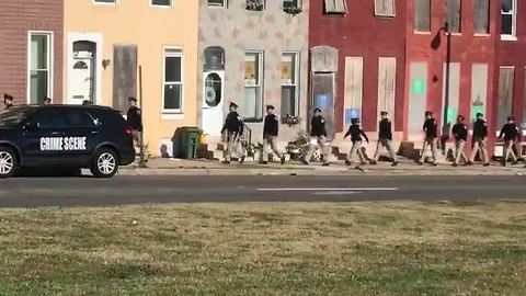 Police continue to search for gunman after Baltimore detective shot
