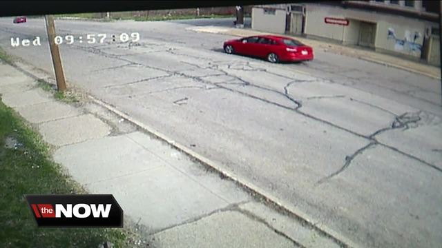 Police working to identify body in burned car on Detroit's west side