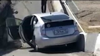 Driver captures moment bridge collapses and swallows car