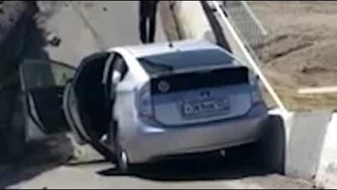 Driver captures moment bridge collapses and swallows car