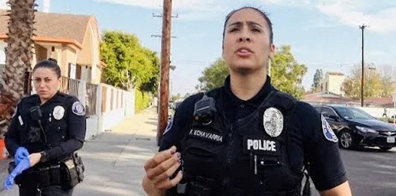 Female tyrant cops roll up hard on get ID but gets put in their place... 1st ammendment!
