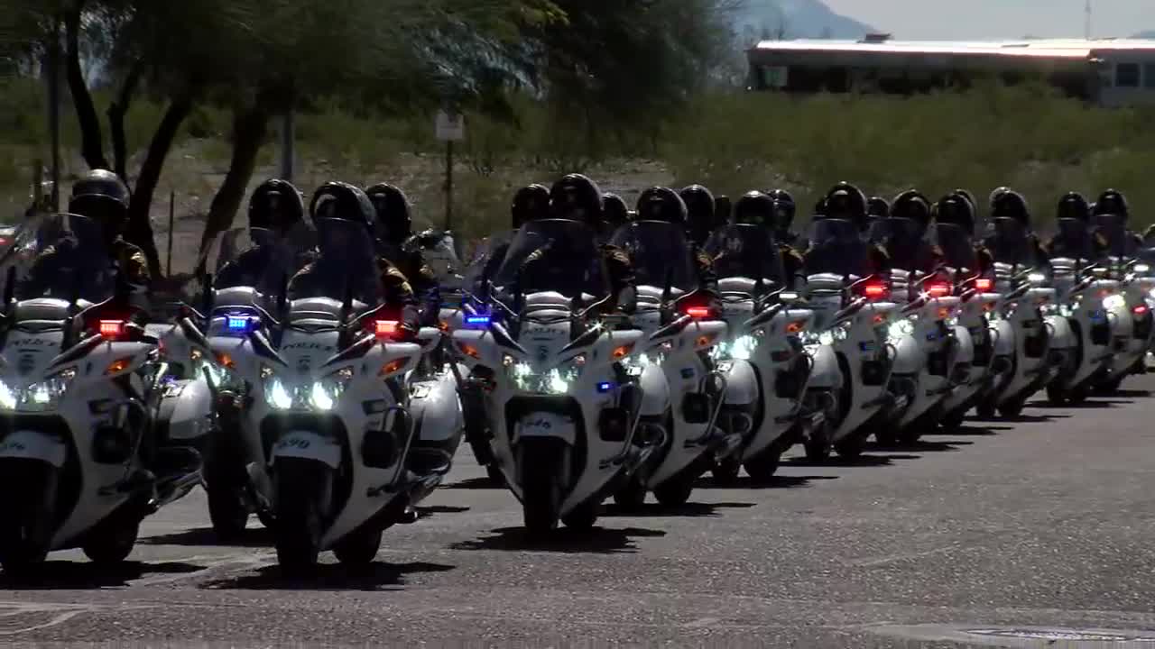 Procession for fallen Arizona officer leaves Pima County