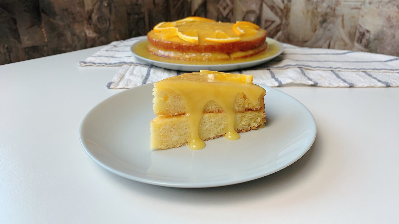 This sophisticated Orange cake ( Cake de Naranja ) will have your family and friends loving you!!