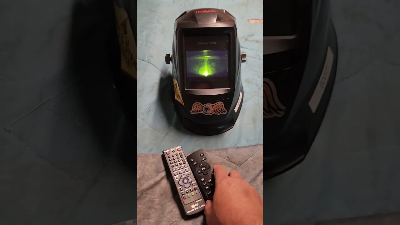 Welding helmet auto darkening test with tv remote