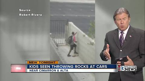 Kids seen throwing rocks at cars