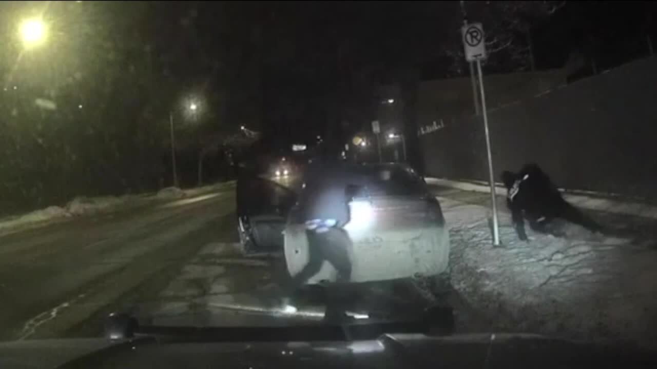 Police video shows suspect shooting Milwaukee police officer, stealing his squad car