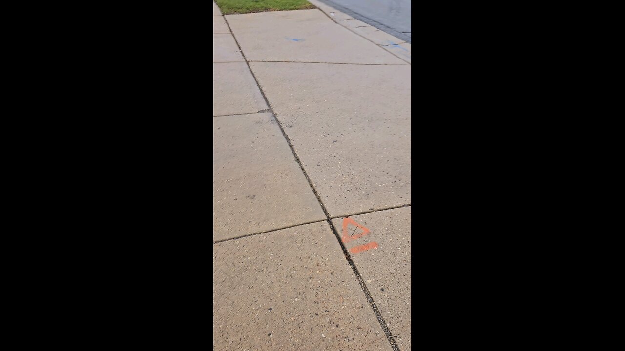 two cars facing each other performing a battery jump