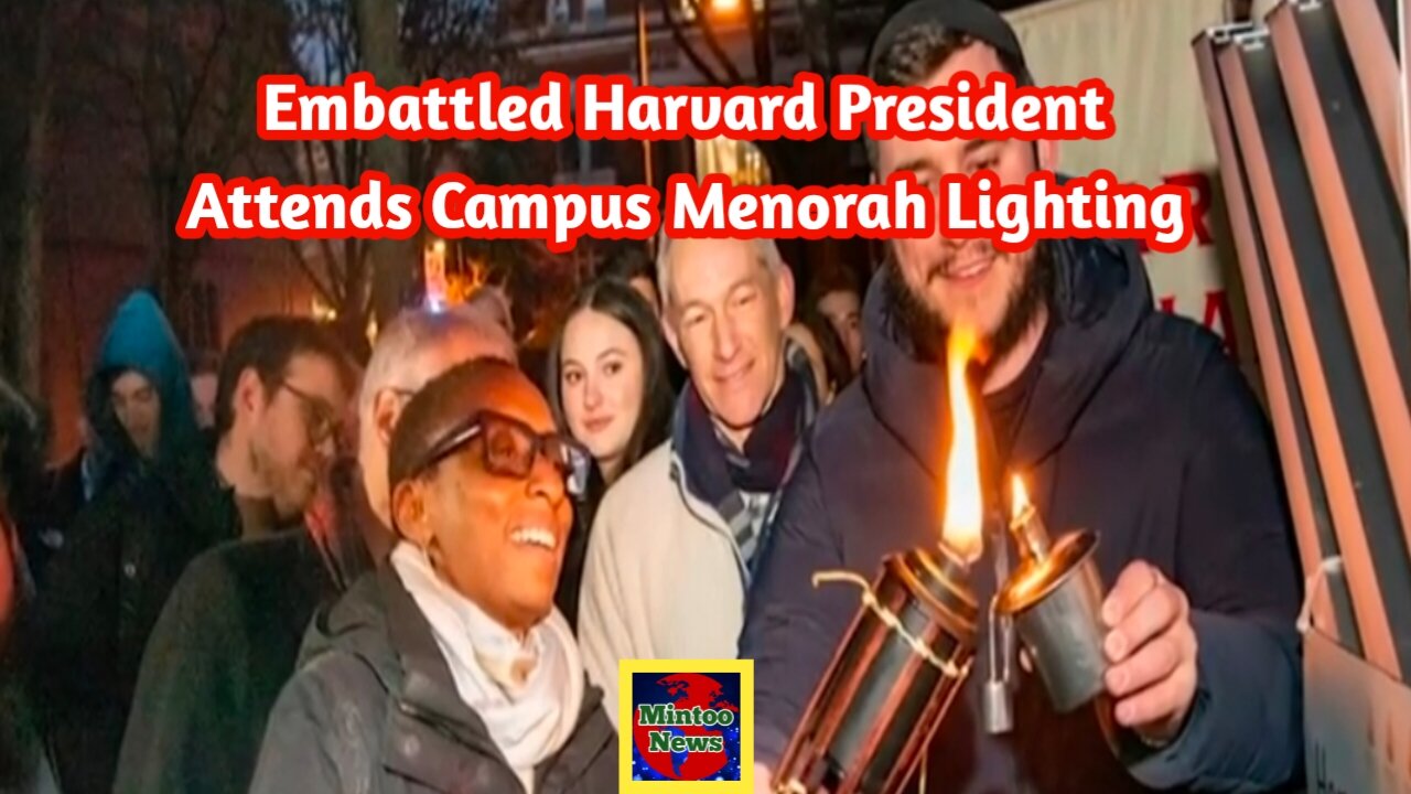 Embattled Harvard president attends campus menorah lighting