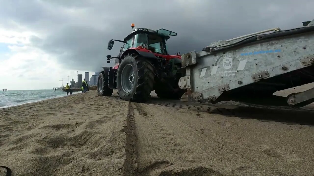 Tractor Pulling Next to me at Beach on the Border with Gibraltar