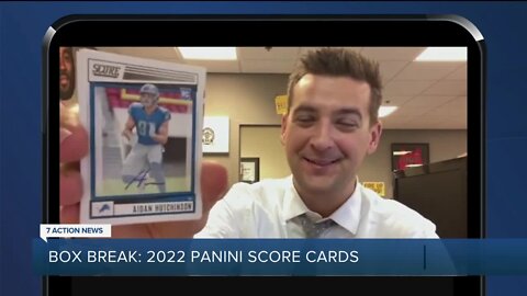 Gotta see it: pulling an Aidan Hutchinson autograph rookie card out of Panini Score football