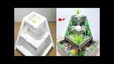 Homemade Styrofoam and cement mini water fountain waterfall