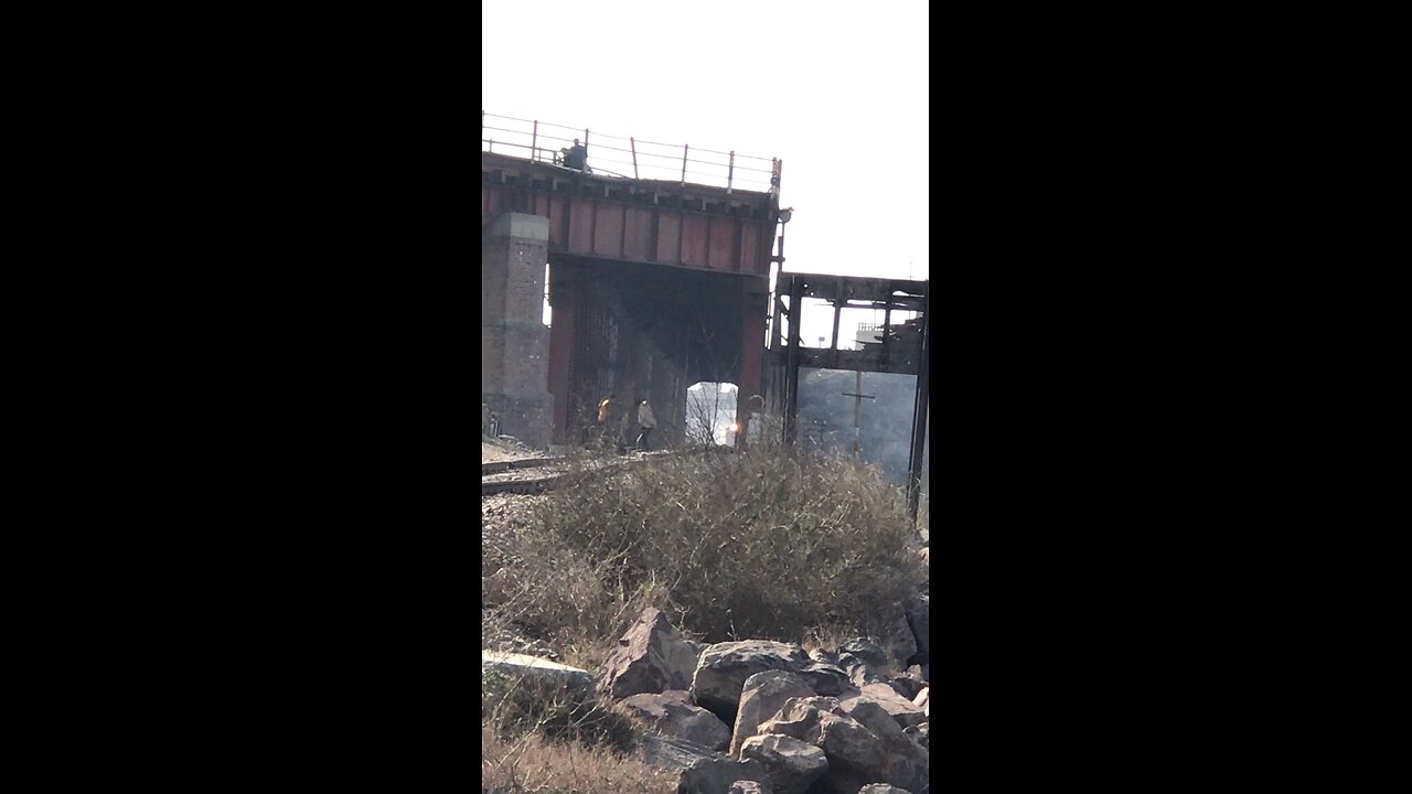 Close view of train coming out of a tunnel