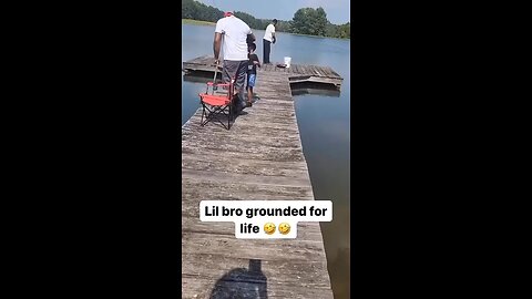 His son got mad and pushed him in the lake