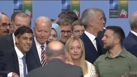 World Leaders Reach Over Biden To Greet Ukrainian President Zelenskyy At NATO Summit In Lithuania