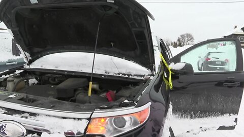 Car clean up begins after a record breaking blizzard covers hundreds of vehicles