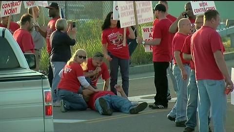 SUV crashes through picket line at DuPont plant