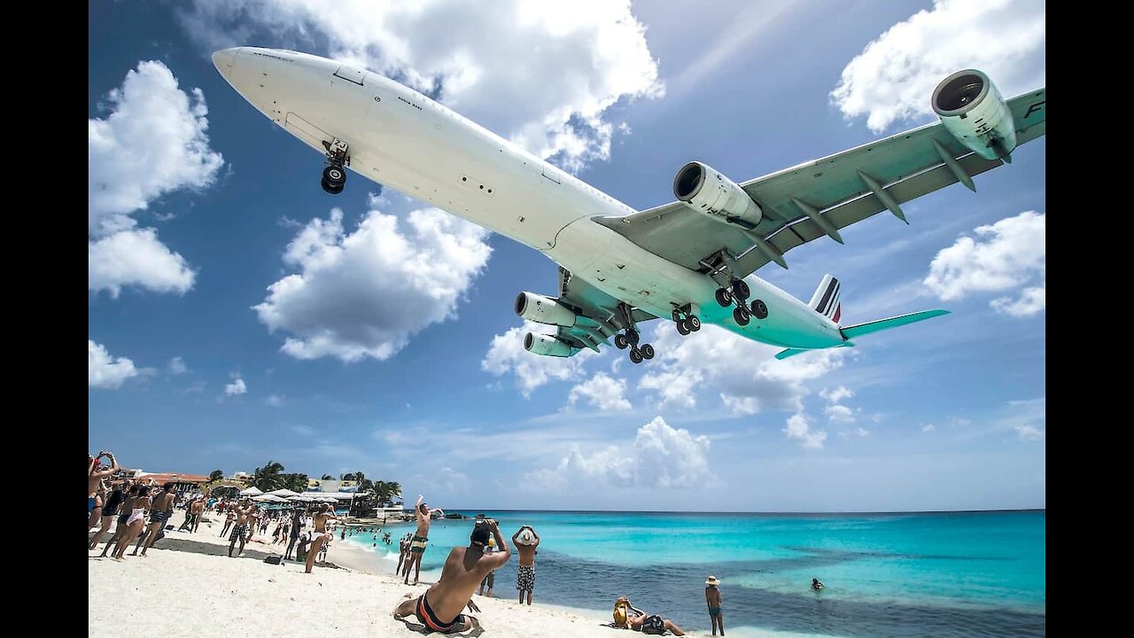 KLM Flight 787 from Schiphol, Amsterdam Landing at Juliana St Maarten Airport, Maho Beach.