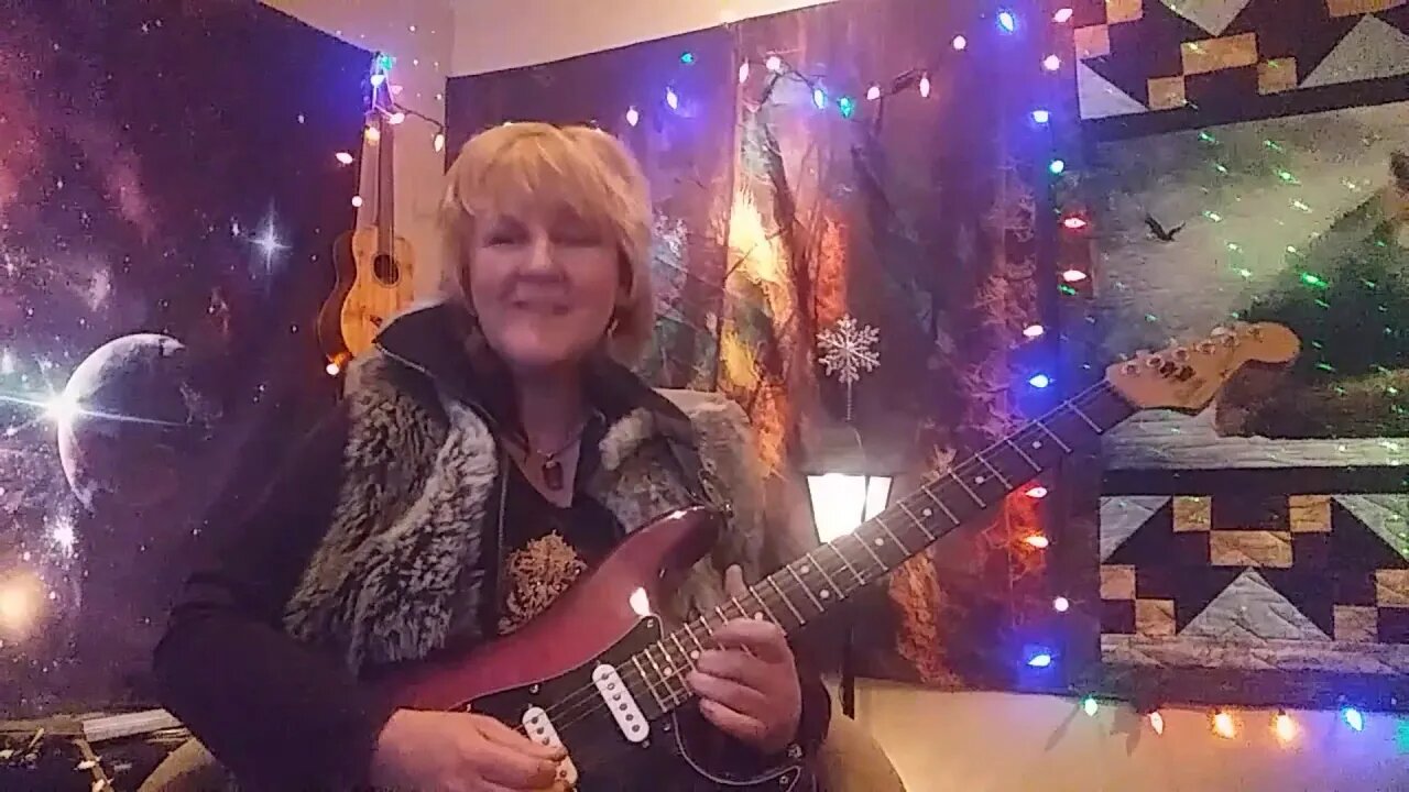 Cari Dell- Female lead guitarist soloing to Texas blues