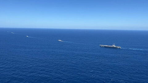 USS Ronald Reagan (CVN 76) sails in formation with HMAS Perth during Talisman Sabre 23