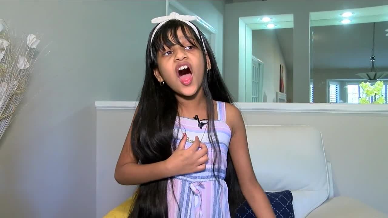 This 7-year-old powerhouse sings to her own tune