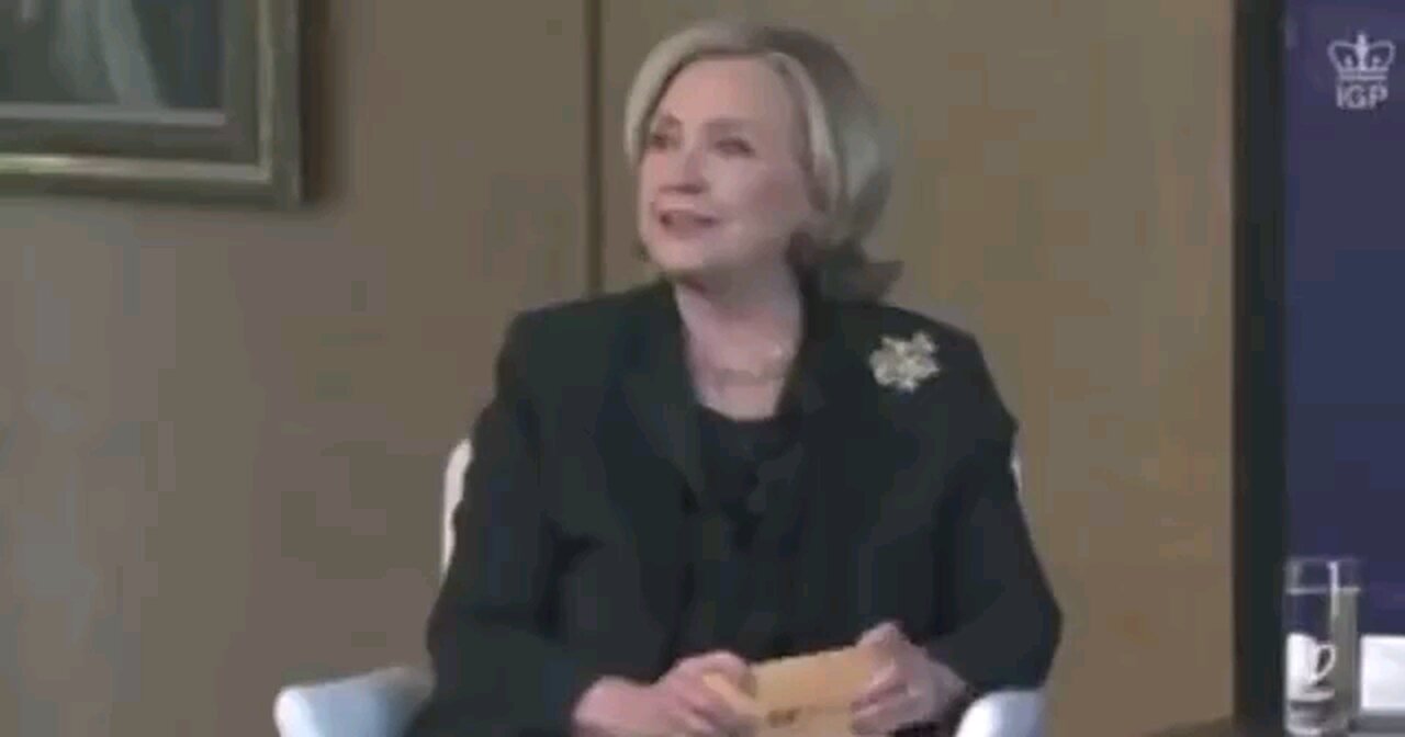 Satanic, endless war promoter, Hillary Clinton is confronted by Robert Castle and Simon Miller