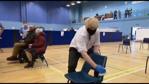 Boris Johnson cleaning a chair, man of the people 🙄.. the David Attenborough Remix...