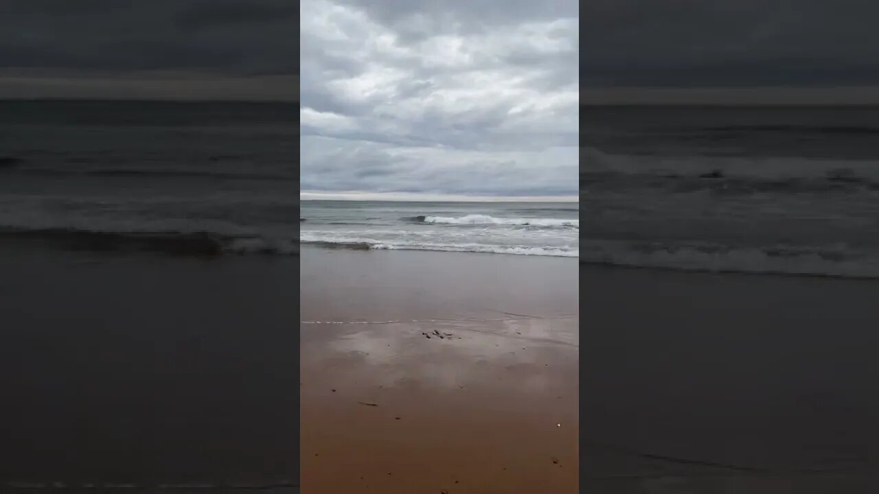 Clouds and waves at the beach
