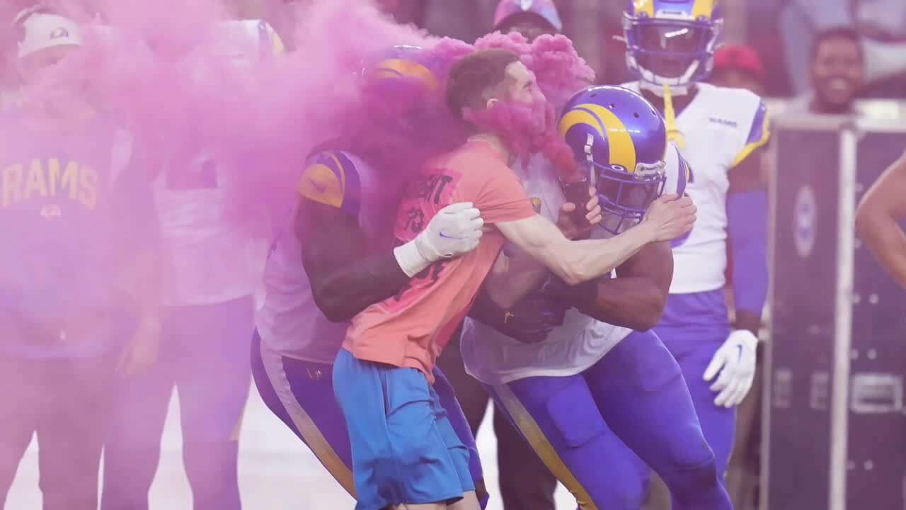 Rams player tackles protester running on field