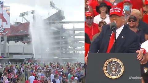 Fire truck spraying the crowd at Trump rally in Tampa.