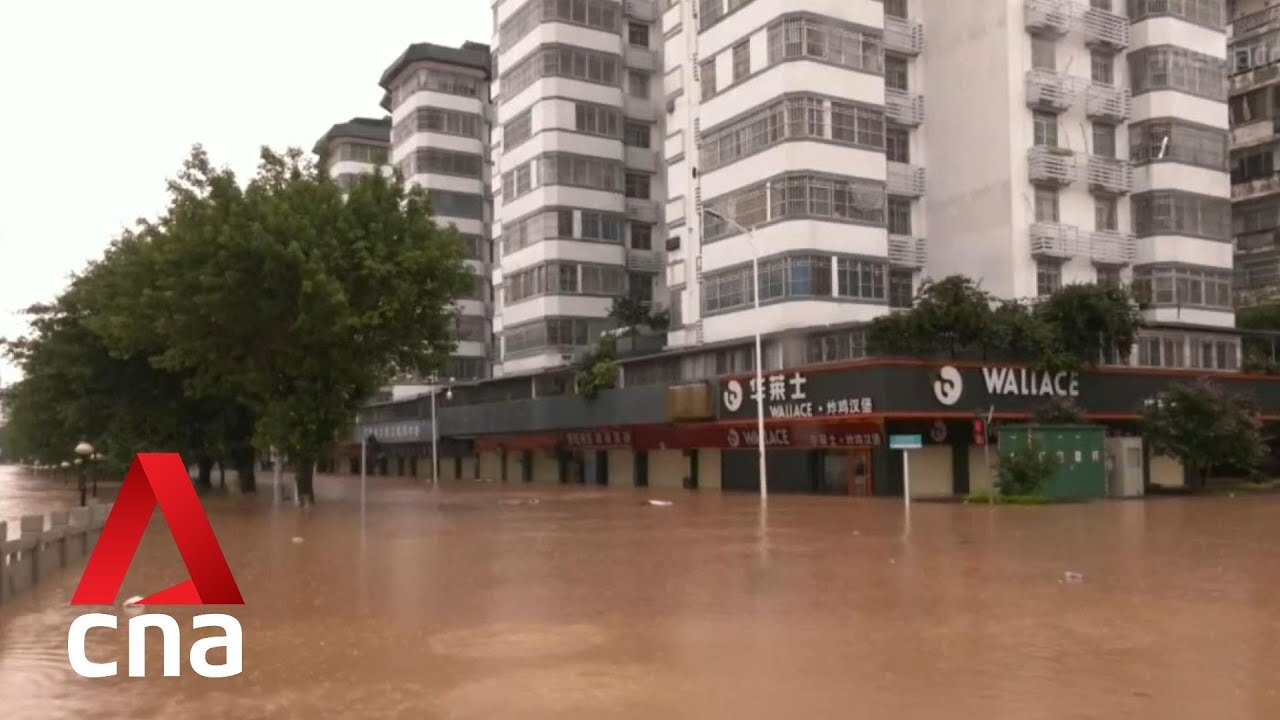 TENS OF THOUSANDS EVACUATED AS FLOODS HIT SOUTHERN CHINA