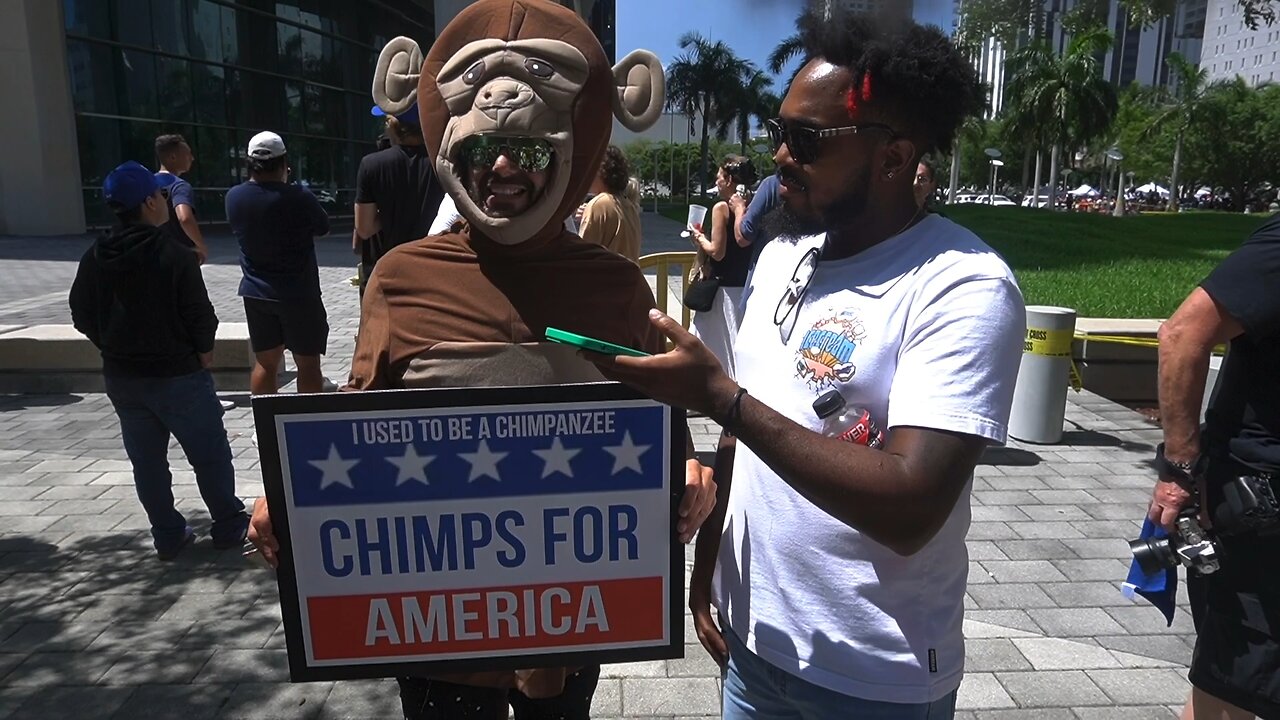 White Man Confronts Man in a Chimp Costume For Being Racist at Donald Trumps Miami Indictment