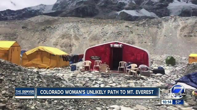 After being laid off from job and years ahead of schedule, a Colorado woman stood atop the world
