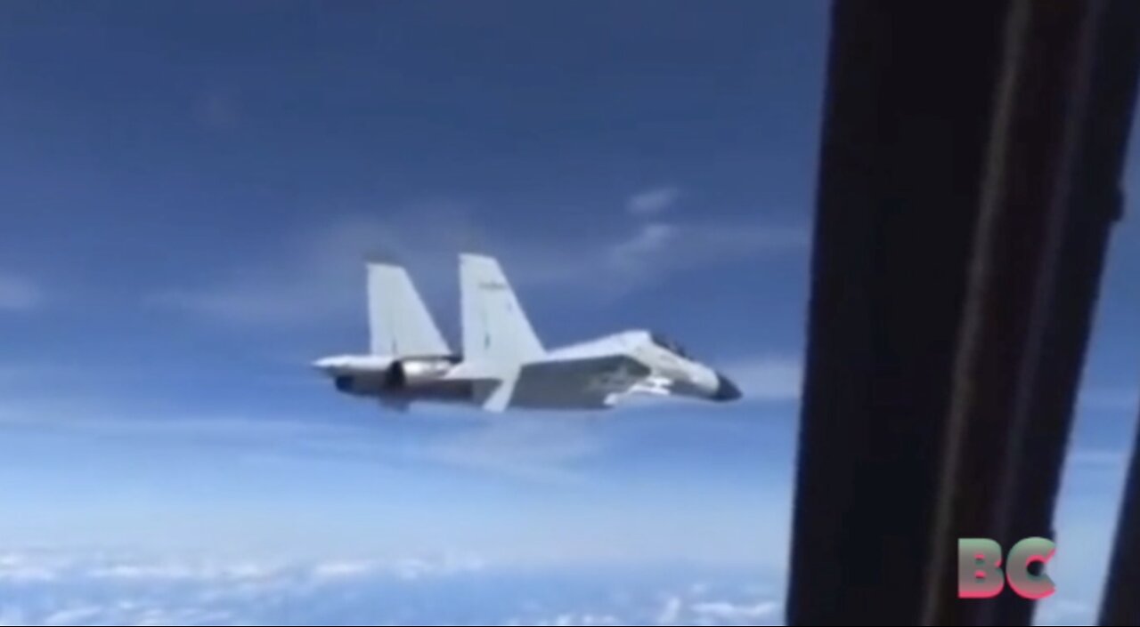 U.S. military plane takes evasive maneuvers after Chinese fighter jet flies within 10 feet (Video)