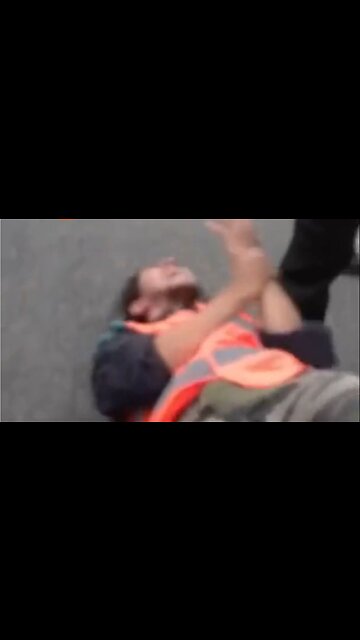 French Cop Deals With Eco-Nuts Glued To The Road The Painful Way