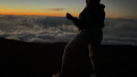 Baby girl twerking on top of A mountain