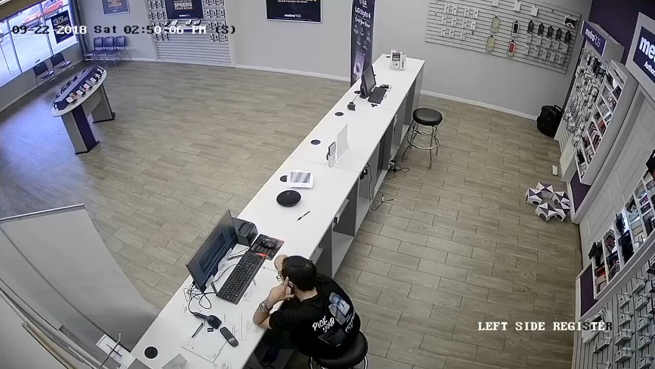 Man tries to rob a phone store, and found out.